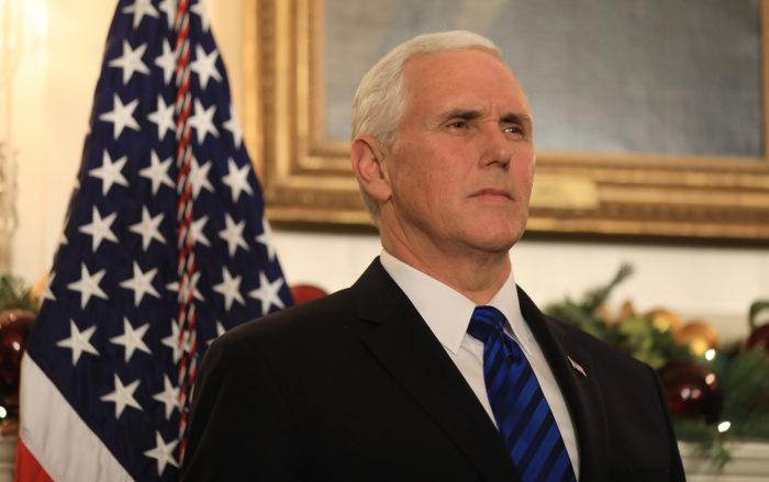 epa06371845 US Vice President Mike Pence listens as US President Donald Trump delivers his controversial decision to formally recognize Jerusalem as the capital of Israel, and his plan to relocate the US embassy to that city, in the Diplomatic Room of the White House in Washington, DC, USA 06 December 2017. The move breaks with years of American foreign policy and could lead to unrest in the Middle East. EPA/JIM LO SCALZO