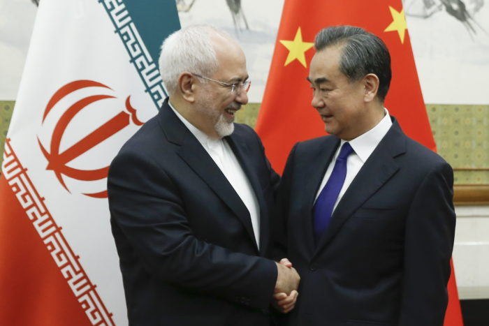 epa06732543 Chinese State Councillor and Foreign Minister Wang Yi meets Iranian Foreign Minister Mohammad Javad Zarif (R) at Diaoyutai state guesthouse in Beijing, China, 13 May 2018.  EPA/THOMAS PETER / POOL